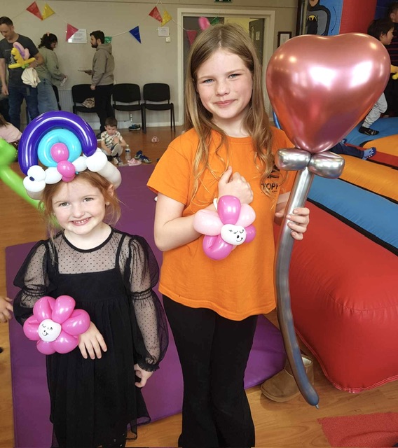 girls with balloon models at a party in Telford